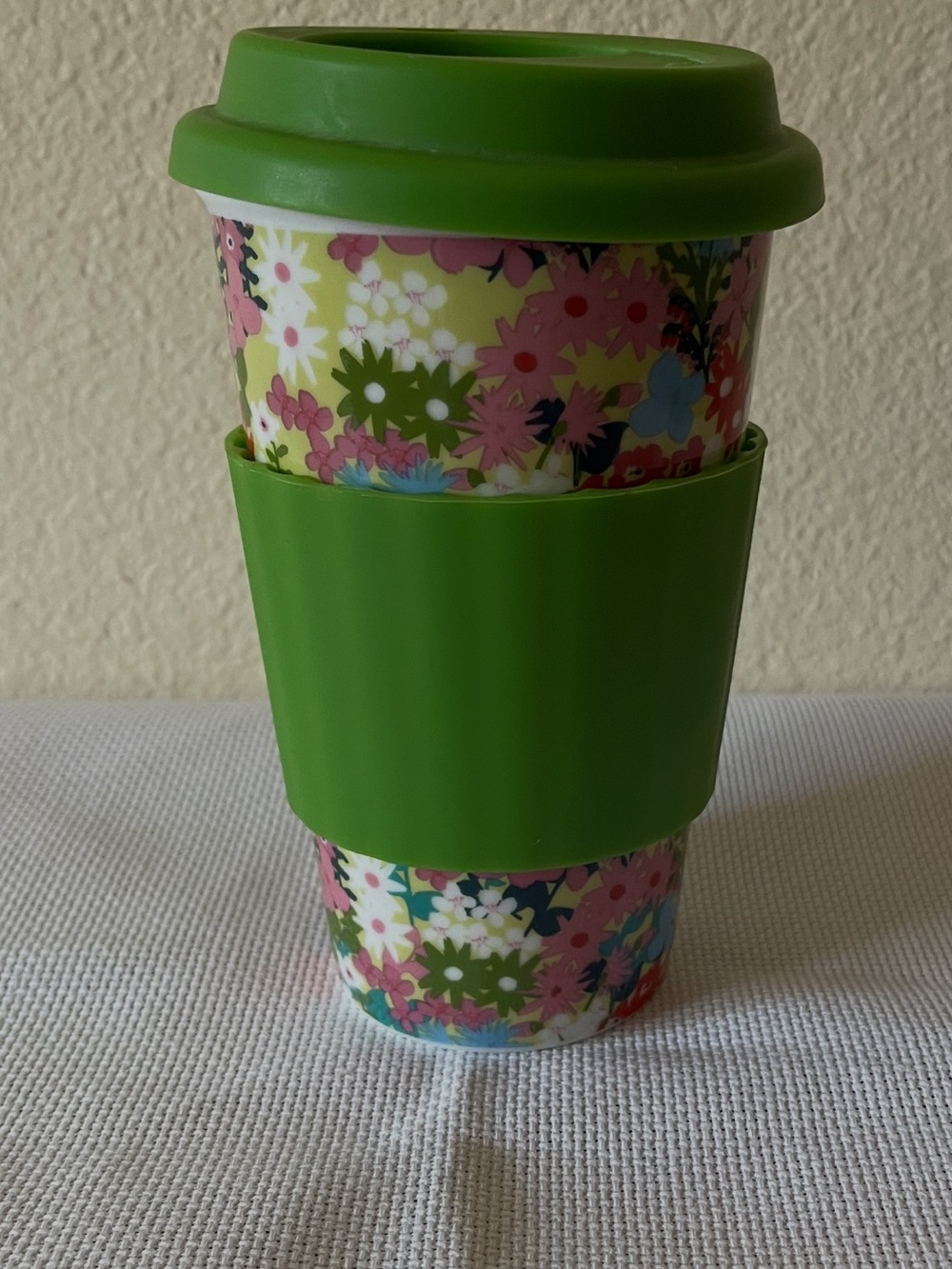 Floral Ceramic Travel Mug with Green Silicone Lid & Sleeve by DCI - Picture 2 of 5